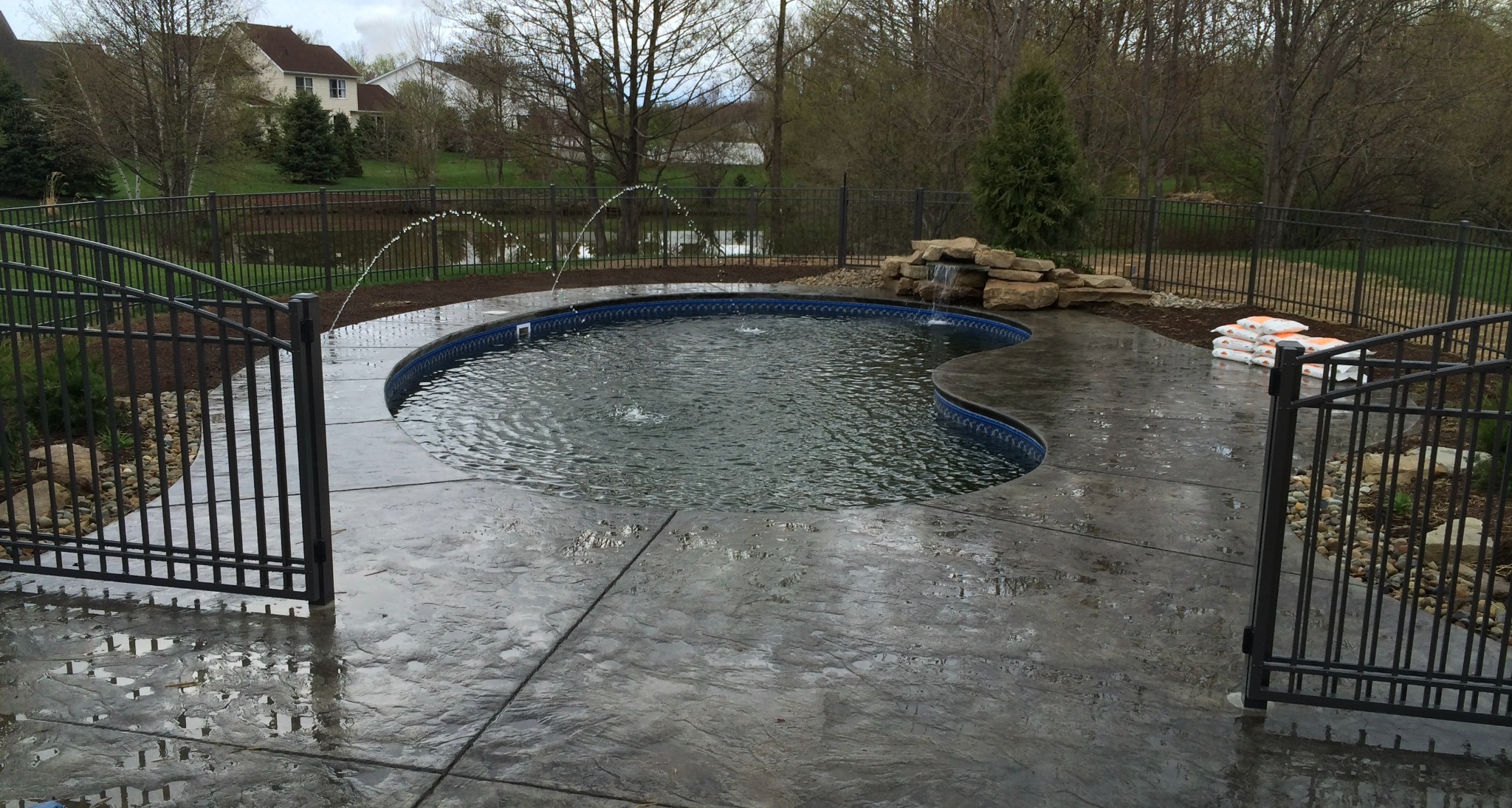 Freeform pool with waterfall